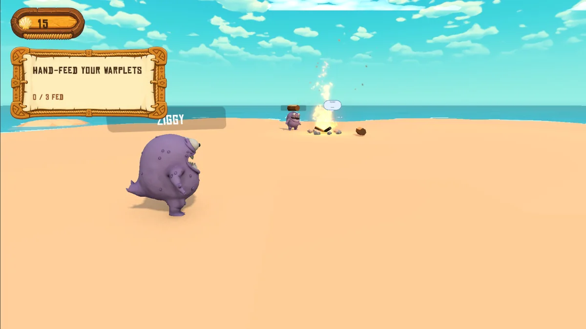 Hand-feeding a Warplet on the beach beside a fire